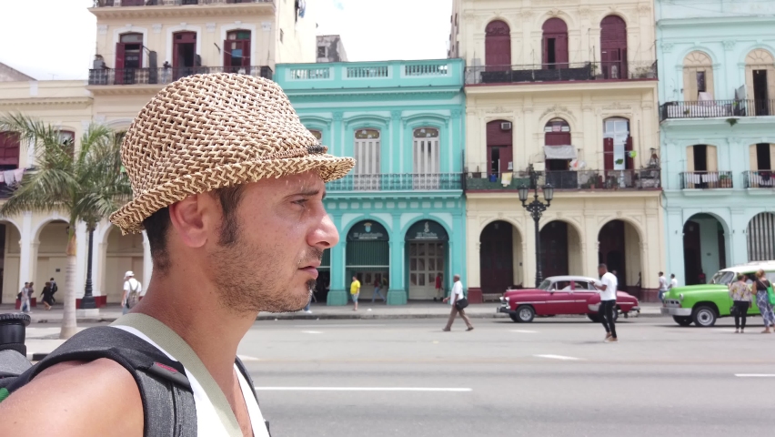 Tourist man enjoy vacation around the streets in Havana City in Cuba. 4k Cuba vlog footages.