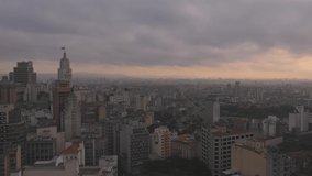 Wide shot of Sao Paulo city crossing between the towers of Se cathedral