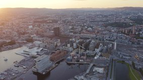 Inscription on video. Oslo, Norway. View overlooking the town. Sunset. Aerial view. Lightning strikes the letters, Aerial View, Point of interest