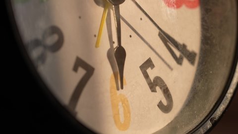 Macro close up shot of clock, watch. Time concept with macro camera. Timepiece, alarm clock classic analog timer