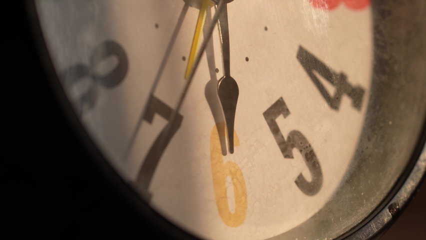 Macro close up shot of clock, watch. Time concept with macro camera. Timepiece, alarm clock classic analog timer Royalty-Free Stock Footage #1088869459