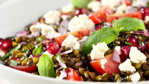 lentils salad with tomato, feta cheese and basil