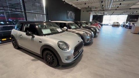 Stockholm, Sweden. 03-08-2022. Inside a mini cooper car retailer store. Classical British auto. Modern style.