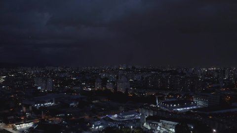 Aerial image of rain, lightning and thunderstorms in sao paulo in marginal tiete.