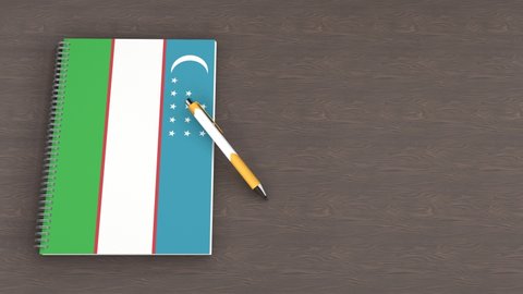 A notebook with the flag of Uzbekistan and a lying pen, 3d animation