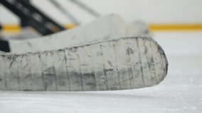 Hockey sticks.

Hockey players hit the ice with hockey sticks. - Powered by Shutterstock - Get 15% off with code: PIKWIZARD15