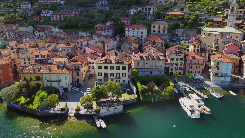 Aerial view of the port of Lake Como. city ​​center. A local ferry arrives in the city. This ferry transports people between different cities on the lake.
The boat is ahead. Italy, Como, April 2022  | Shutterstock HD Video #1088881541