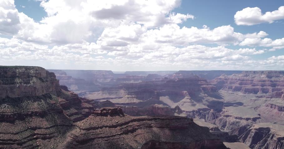 Clouds over Grand Canyon Time Lapse. Grand Canyon drenched with desert color and clouds. Grand Canyon National Park.
