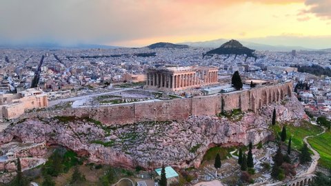 Parthenon of Athens at dawn, sunrise in Greek capital Athens, aerial view of Acropolis, classical ancient Greek monument. High quality 4k footage