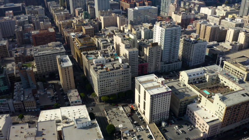Financial skyscrapers. Business district with skyscrapers. Rising drone shot from residential buildings. Aerial view of cityscape. Urban aerial view of beautiful and scenic downtown Los Angeles. 