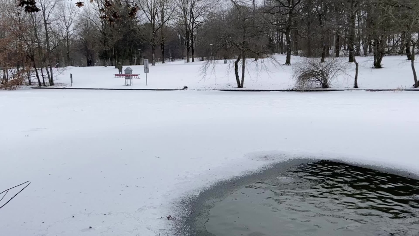 A lake that is partially frozen 
