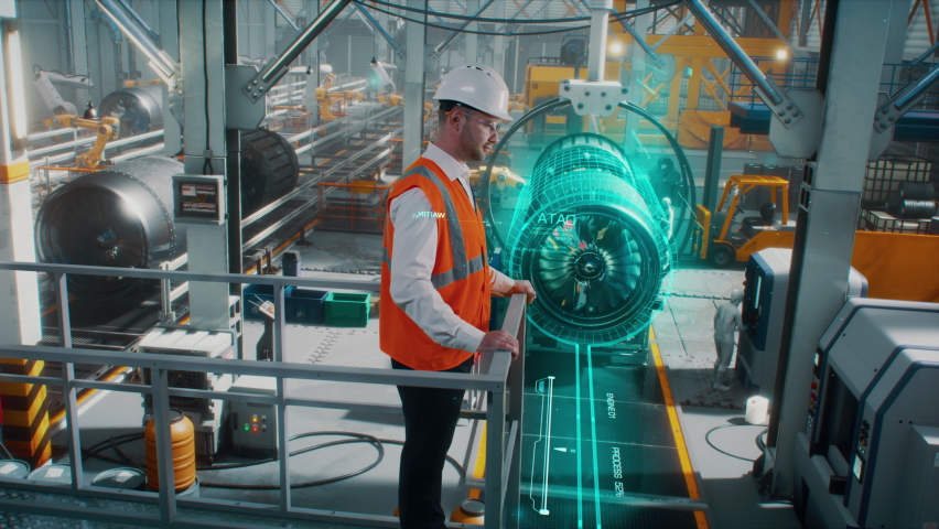 An engineer on a high-tech robotic line for the production of aerospace engines controls information using a modern innovative graphical interface. Royalty-Free Stock Footage #1088890249