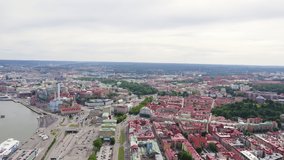 Inscription on video. Gothenburg, Sweden. Panorama of the city and the river Goeta Elv. The historical center of the city. Cloudy weather. Text furry, Aerial View