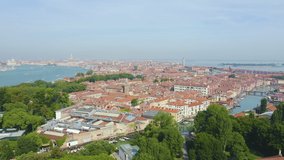 Inscription on video. Venice, Italy. Panoramic view of the historic center of Venice. sunny day. Arises from blue water, Aerial View