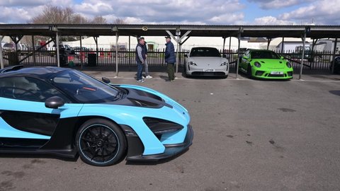 Goodwood, West Sussex, UK, April 02, 2022. A McLaren Senna Limited Edition sports car  in the paddock area at Goodwood on a race day. With audio.