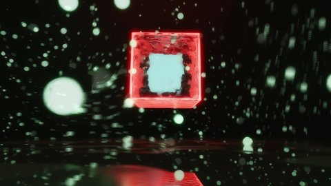 3dlLooped animation of red glass cube rotating with glowed particles on black background