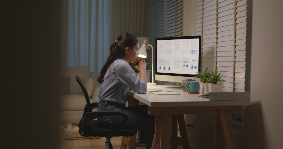 Asia people young woman study hard overnight brownout bored remote learn online read data tired sitting head in hands at home office desk workplace think worry in job tough stress workforce issue. Royalty-Free Stock Footage #1088905637