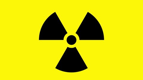 Radiation sign on a yellow background. The risk of nuclear war and radiation pollution