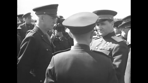 CIRCA 1945 - General Eisenhower leads an inspection of Russian troops.