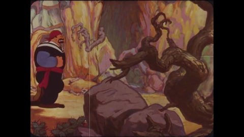 CIRCA 1936 - In this animated film, Sinbad (Bluto) taunts a giant bird and snake he's caught.