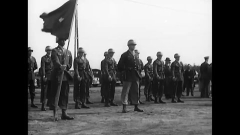 CIRCA 1949 - General Clay oversees an Army Day parade put on by the 6th Armored Cavalry in Grafenwohr, Germany.