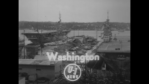 CIRCA 1951 - The USS Essex and USS Bon Homme Richard are recommissioned for use by the US Navy in a ceremony overseen by Admiral Nimitz.