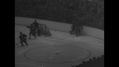 CIRCA 1950 - The Detroit Red Wings defeat the New York Rangers in a game for the Stanley Cup.