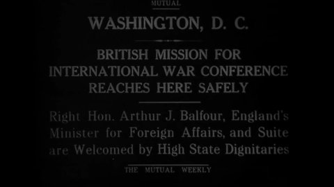 CIRCA 1920s - Arthur Balfour, England's Minister for Foreign Affairs, meets Secretary Lansing in Washington DC and is met by huge crowds.