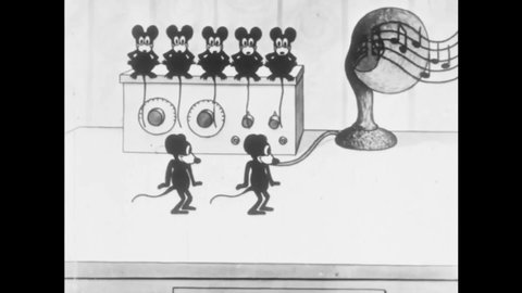 CIRCA 1924 - In this animated film, mice dance to the radio and play leap frog around a circle of mouse traps.