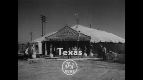 CIRCA 1950 - Activity in Gainesville, Texas ceases so that townspeople can attend the circus.