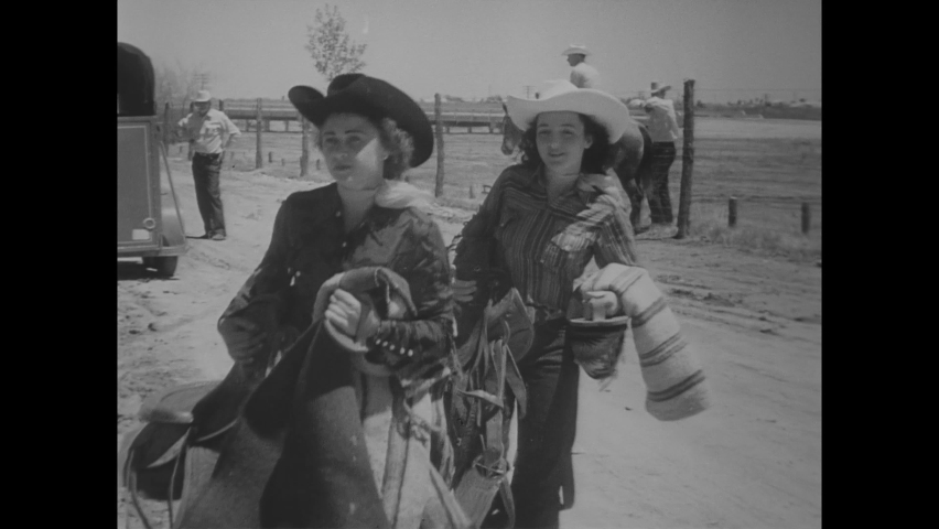 CIRCA 1951 - Cowgirls participate in a special women's rodeo, riding bucking broncos and bulls.