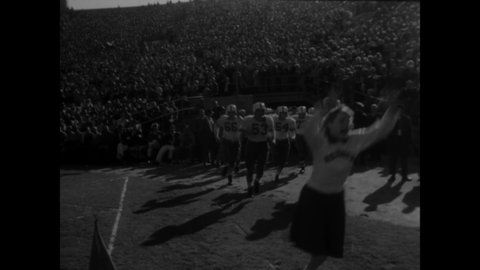 CIRCA 1953 - The USC Trojans defeat the Wisconsin Badgers in a college football game.