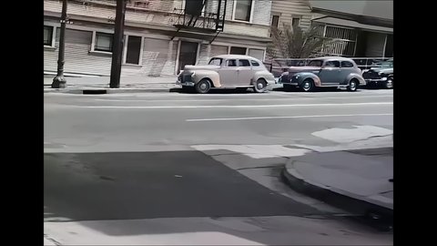 CIRCA 1940s - A camera fixed on a car is driven through Bunker Hill in Los Angeles, California.