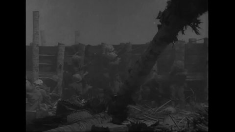 CIRCA 1943 - US Marines use flamethrowers on Tarawa.