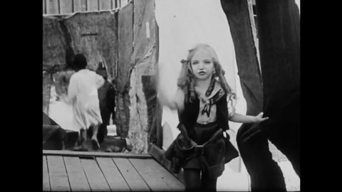 CIRCA 1924 - In this comedy movie, a little girl addresses bullies in the audience of her wild west show.