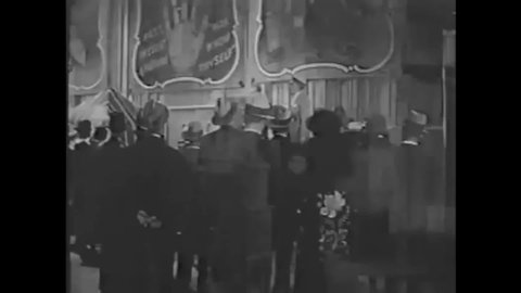 CIRCA 1934 - In this mystery movie, circus spectators enjoy a Punch and Judy puppet show.