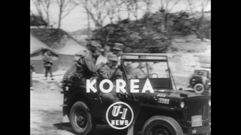CIRCA 1953 - Former presidential candidate Adlai Stevenson visits South Korean, British, and American soldiers stationed in Korea.