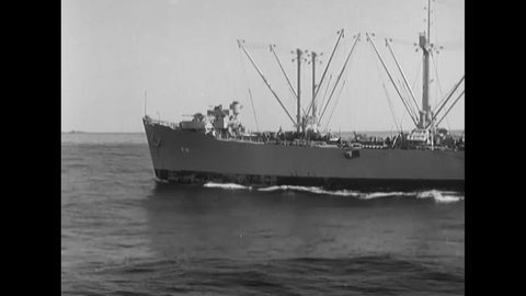 CIRCA 1951 - Sailors on the USS Princeton throw metal stools overboard.