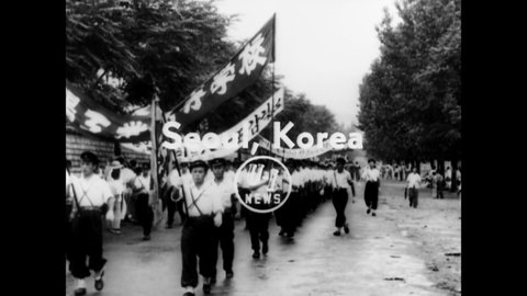 CIRCA 1954 - President Rhee addresses a cheering crowd of all ages in Seoul, Korea.