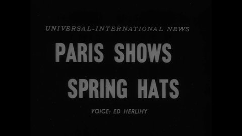 CIRCA 1954 - Women model Parisian spring hats.