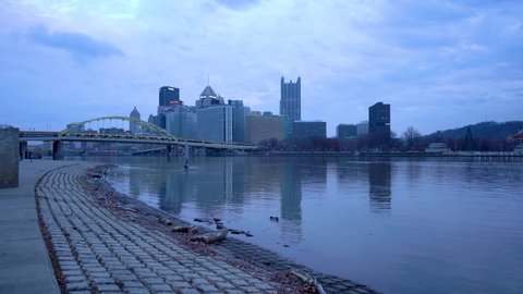 Pittsburgh , Pennsylvania , United States - 03 13 2022: Pittsburgh Skyline downtown is seen from the Allegheny river waterfront