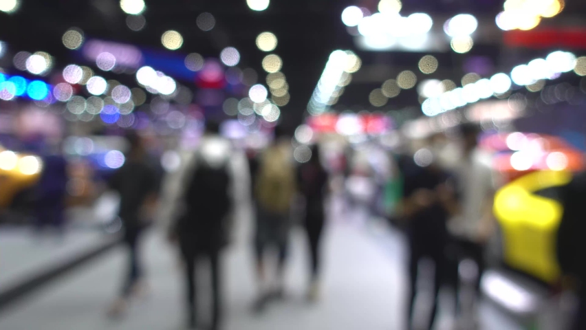Abstract background blurred many people in the exhibition expo event or trade fair Royalty-Free Stock Footage #1088920883