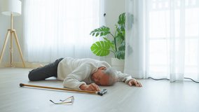 Asian senior male falling on the ground while walk with walker at home. Elderly older mature grandfather having an accident after doing physical therapy alone after retirement in living room in house. - Powered by Shutterstock - Get 15% off with code: PIKWIZARD15