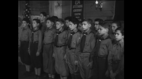 CIRCA 1930s - Jewish Boy Scouts recite their oath in New York City.