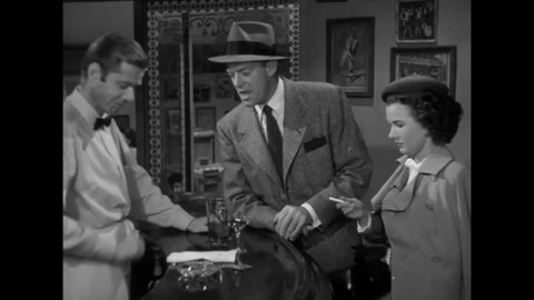 CIRCA 1949 - In this film noir, a newspaperman asks a soda jerk what he knows about an adoption black market.