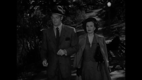 CIRCA 1949 - In this film noir, a reporter flirts with a woman while he tells her how they might track down her missing sister.