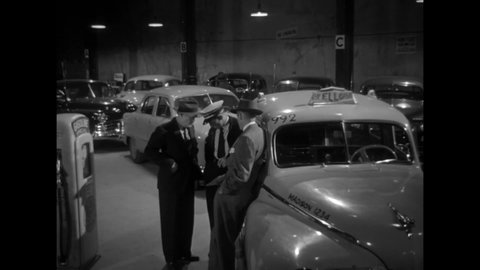 CIRCA 1949 - In this film noir, policemen's different roles and equipment in a stakeout are explained.