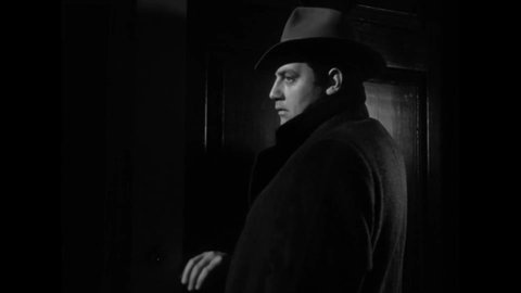 CIRCA 1949 - In this film noir, a gangster updates his female boss about investigations surrounding a murder they committed.