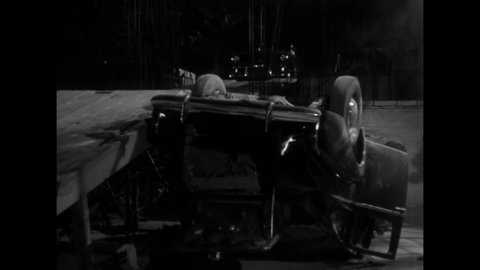 CIRCA 1949 - In this film noir, a gangster kills a driver trying to get away at night.