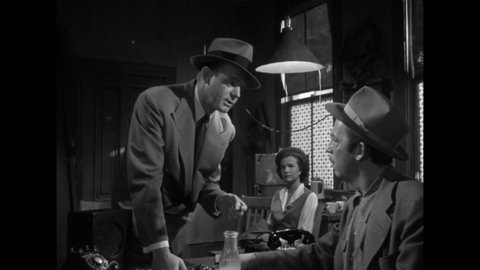 CIRCA 1949 - In this film noir, a gangster considers starting an adoption racket.